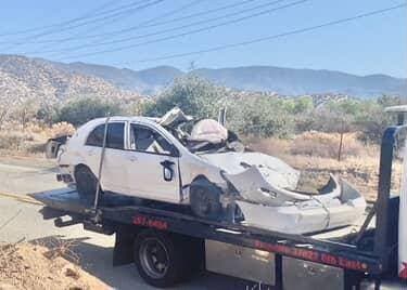 Both vehicles being removed from Mt Emma Road fatal collision scene. The...