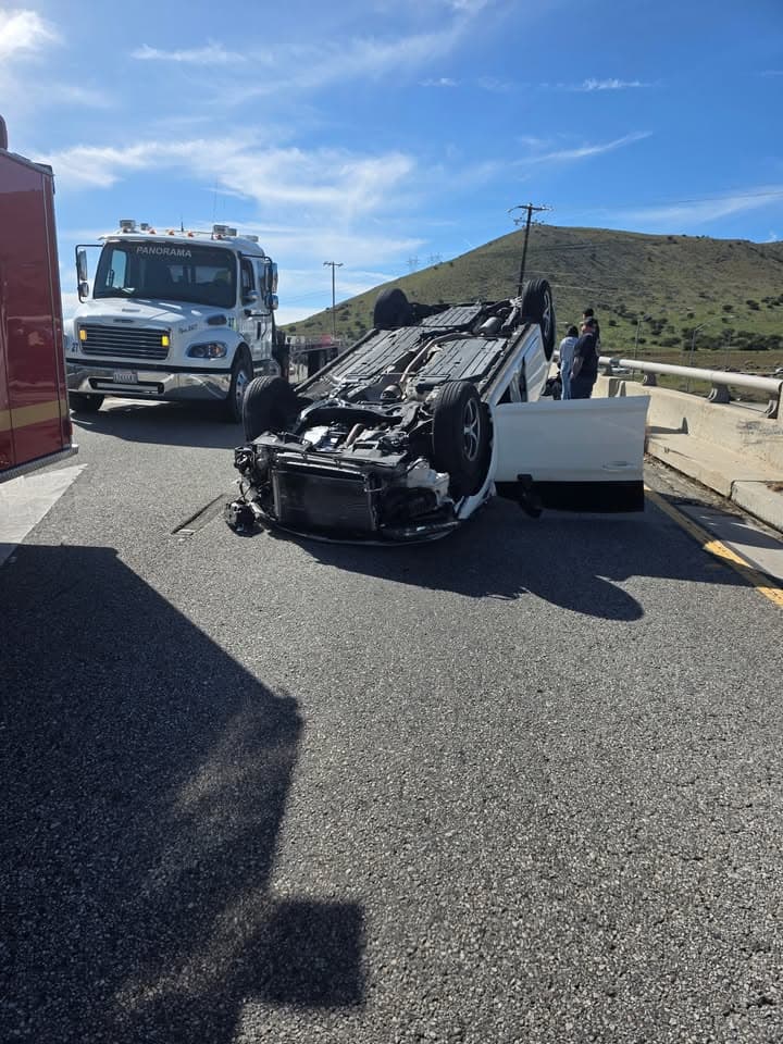 11-79.....Northbound 14 at Pearblossom Highway offramp....white Honda Civic vs white 2500 Dodge...
