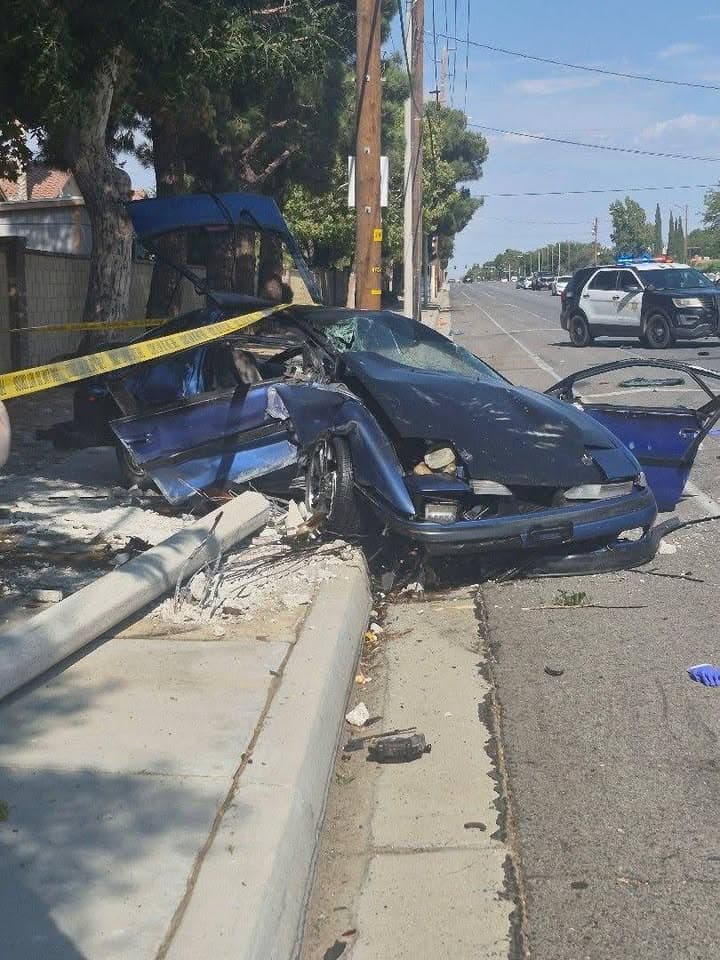 Photos from earlier solo vehicle vs pole collision on 7th Street East...