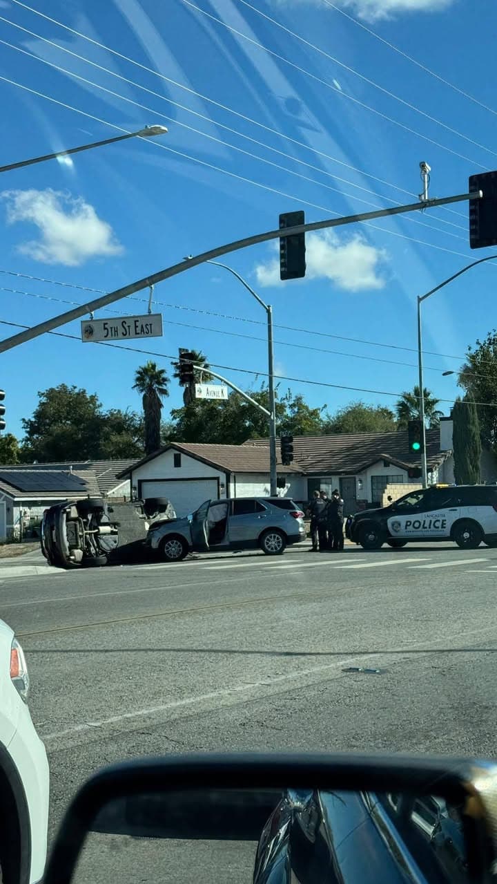 Deputy responding to a call for service came upon a two vehicle collision, one on its side · requesting FD and LPD